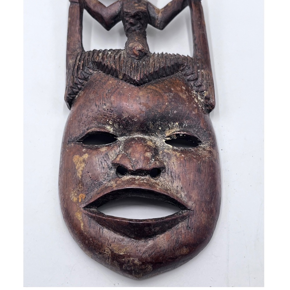 Vintage AFRICART Guro
Mask Hand Carved Dark Wood
Made in Malawi